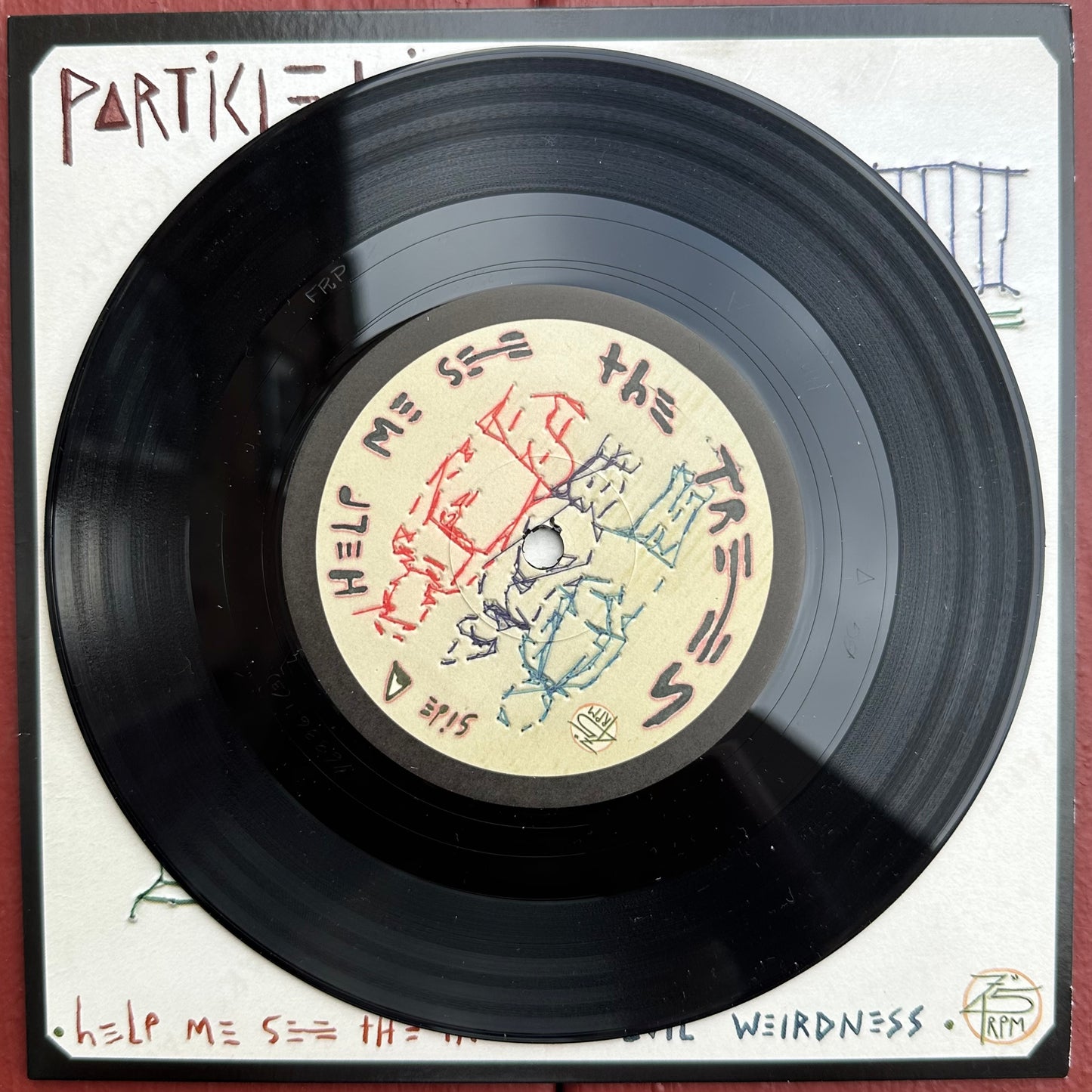 7" Particle Kid Help Me See The Trees / Evil Weirdness